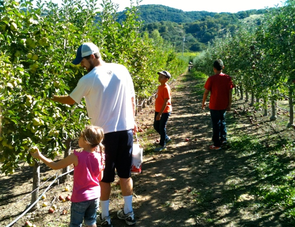 Selecting our bounty with first-timer cousins.